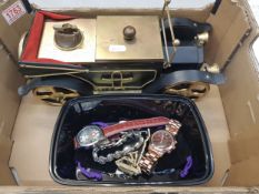 A novelty cigarette box/table lighter in the form of a vintage car together with men's and ladies