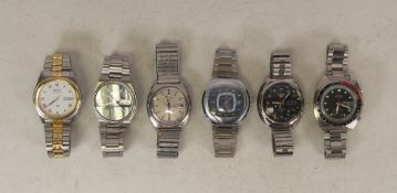 Four Seiko automatic gentleman's wrist watches all appear to be in ticking order at the time of