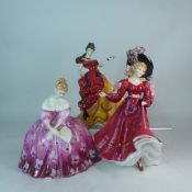 Three Royal Doulton lady figures to include Victoria HN2471, Belle HN3703, figure of the year