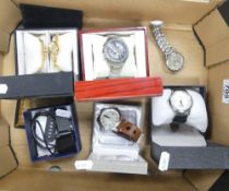 Six Boxed Fashion Wristwatches including ladies wristwatch and bracelet