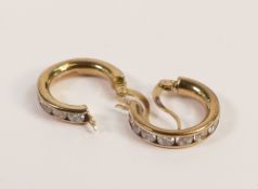 Pair 9ct gold earrings set with CZ stones, 2.4g.