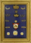 Framed Group of 16 Military Emblems, Badges and Pins. Size incl. frame, Height: 38cm Width: 28cm