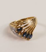 18ct gold crossover ring set with sapphires and diamonds, (3 sapphires missing), size J,4.4g.