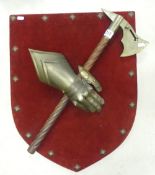 Large Decorative Shield with armoured glove and axe. Velvet red backing. Height: 57cm
