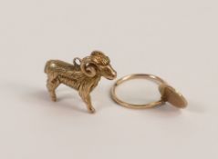 9ct gold Ram charm and 9ct gold earring, 3.6g.