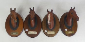 Four Plaque mounted Beswick Horses Heads to include The Minstrel , two Arkle's, Red Rum (4)