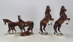 A selection of gloss brown horses to include two Rearing Horses, two Mare and Foles stamped Foreign,
