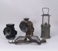 A collection of oil lamps to include bicycle lamp by The Winner PH Ltd, Calcia King 318E and Ever