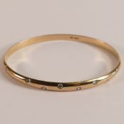 Fine quality fully UK hallmarked 9ct Gold ladies bangle set 9 x 2mm diamonds of good colour and