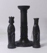 Wedgwood black basalt King and Queen chess pieces together with a footed black basalt candle