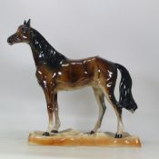 Large gloss Huntsman horse on landscape plinth stamped Piece d Art m. depose , 36cm tall