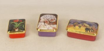 Three Halcyon Days enamels featuring Amaryllis Lilly, Circus Elephants and Snow under Arch of The