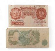 Ten shilling bank note , Cashier L.K O Brian and one pound note page. (2)