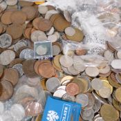 A large collection of old coins and banknotes including £2 coins,copper and silver world coins,