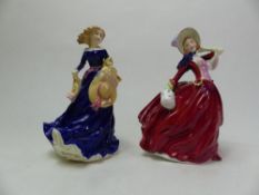 Royal Doulton Figurine Autumn Breezes HN1934, together with Moonlight Stroll HN3954 (2).