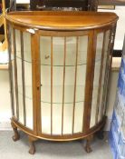 A resin type sculpture featured on a plinth resembling Aphrodite with cherubs riding a fish (