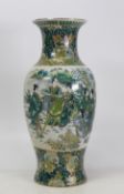 Chinese green and white baluster vase with gilt finish depicting figures in traditional style