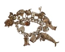 Silver charm bracelet set with 14 large quality charms, 154.5g.