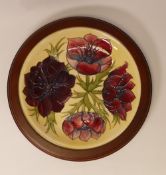 Moorcroft Plate 783/10, 'Anemone' design on Cream ground measures 30cm including surround