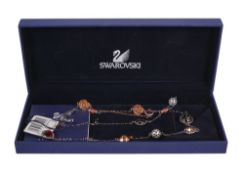 Swarovski necklaces set with various coloured gemstones, flowers and balls, boxed with certificate.