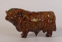 Rutherford's full and sealed novelty decanter in the form of a bull, 70cl and 40%.