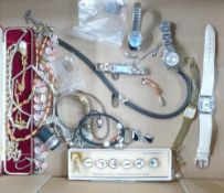 A collection of costume jewellery, ladies watches, Guiness button set, necklaces and more.