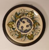 Moorcroft Plate 783/10, 'Juneberry' designer Anji Davenport on a cream ground, measures 30cm