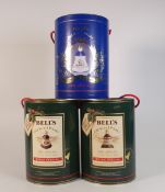 Two Bell's Whiskey full, sealed and boxed Christmas decanter's from 1990 and 1991, together with
