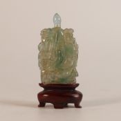 Chinese, possibly Jade, carved stone snuff bottle. The front shows male and female figures bearing