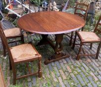 Vintage priory extending dining table 126cm W 116cm D 76cm H with 4 matching ladder back rush seated
