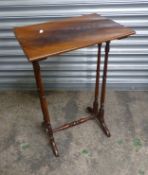 Mahogany pedestal table with rectangular top, double splayed legs for support. measures 70cm high