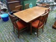 Mcintosh Mid-century Teak dining room extending table together with 6 matching upholstered dining