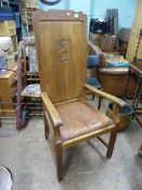 Oak fireside open armchair with carved stag detail to backrest 138cm H x 65cm W x 60cm D