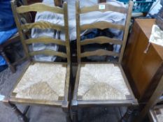 4 x dark oak rush seated ladder back dining chairs