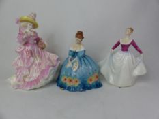 Royal Doulton lady figurines, Camellias HN3701, Victoria HN3416 and Lisa HN3265 (3).