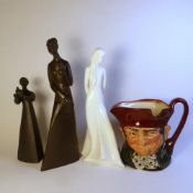 Two Royal Doulton matt black figures, Sympathy HN2838 and Peace HN2433, together with Images