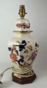 Mason's Blue Mandalay pattern large table lamp raised on a hardwood base, overall height 39cm.