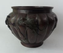 Japanese Edo period bronze jardiniere, decorated with birds in relief, height 19cm.