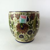 Ceramic planter with brass inlay, height 21cm.