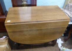 Light Oak dropleaf dining table 147cm W 90cm D x 97cm H