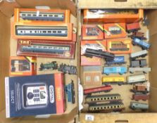 A large collection of HO/OO gauge locomotives, rolling stock and track accessories to include Lima