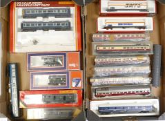A collection of HO/OO gauge carriages and freight wagons from Hornby, Liliput, Jouef, Fleischemann