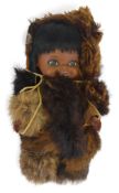 Vintage Reliable Toy Co., made in Canada, Native American doll, in leather and fur clothing. (H: