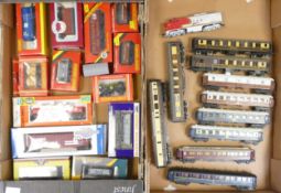 A collection of HO/OO gauge carriages and freight wagons from Airfix, Tri-Ang, Wrenn, Liliput,