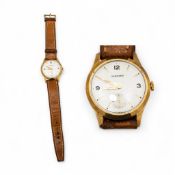 9ct gold Garrard mechanical wristwatch, seconds dial with leather strap, inscribed presentation to