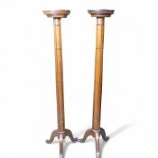 C1910 pair of Oak Torchere stands on tripod legs in the manner of the Arts and Crafts movement. Each