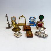 A selection of assorted pocket watch display stands and travel cases to include:- Silver stamped