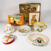 A collection of Shelley China Mable Lucie Atwell china items, including two baby's plates, cups,