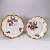 Caverswall shaped gilded cabinet plates, hand painted with flowers by M Grant. Max. D.25.5cm