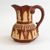 Circa 1820 Spode Rosso Antico Hydra jug. Heavily decorated in white / cream coloured Neoclassical